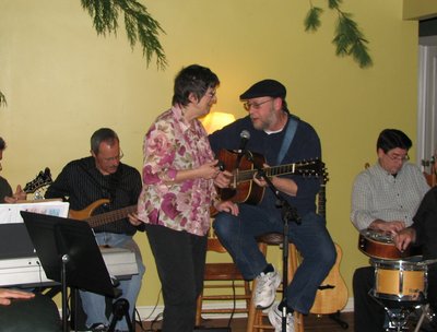 Playing a house concert at my friend Larry Goetzs house with Clara, Peter Hayes, Paul Iaboni, Russ C