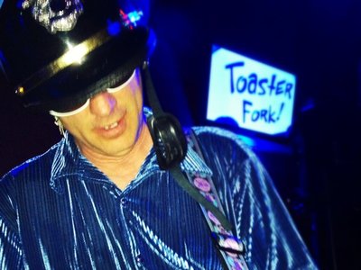 Officer Hovey crushing a guitar solo