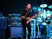 Jon singing and playing guitar at the Frampton show.
