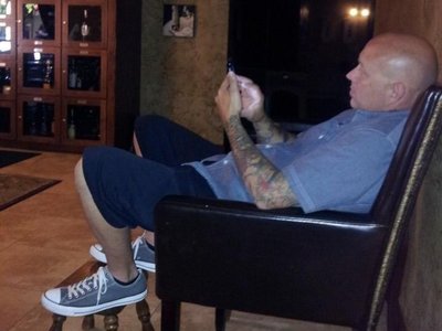 Chillin back stage playing Candy Crush.