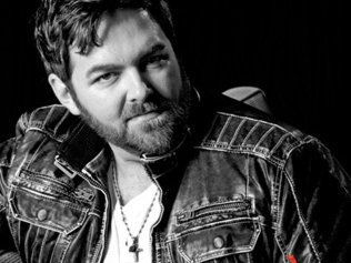 Still from James Robert Webb photoshoot for his new album.