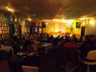 Introducing my audience to a new song at Gracie's Cafe