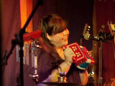 Tami playing emergency backup accordion