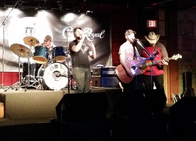 On stage at battle of the bands..