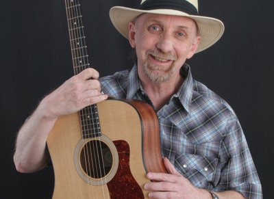 Paul Arow with Taylor Guitar