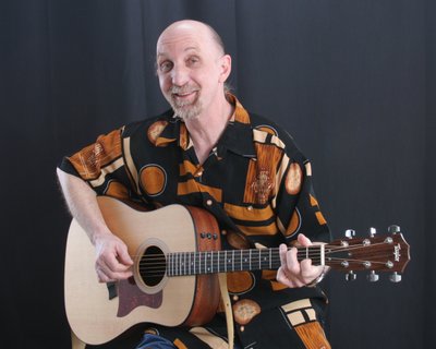Paul Arow with Taylor Guitar