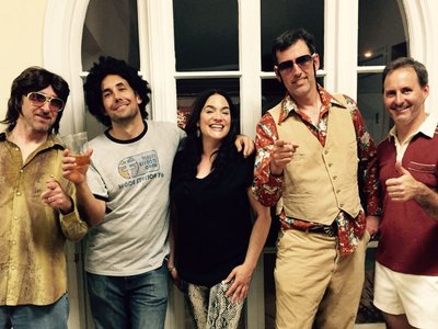 Playing at a 70s party.