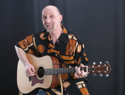Paul Arow with Taylor Guitar