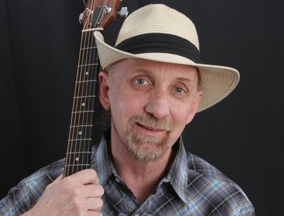 Paul Arow with Taylor Guitar