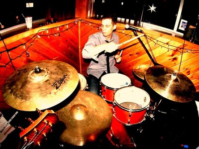Jason Nowak on drums, laying it down smooth and steady...