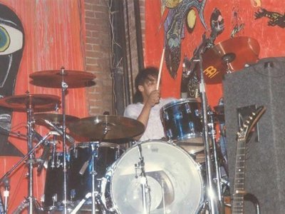 Lock-Up Club Tour Days-Pearl Export Kit with Meinl Cymbals. Tom Morello's Explorer in the shot.