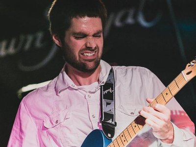 Michael shredding lead guitar