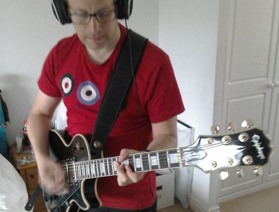 Peter recording guitar parts