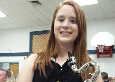 Grandaughter getting ready to play the bass clarinet at her school concert!