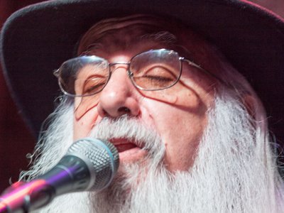 Dr. Paul performing in concert at the Martyn House in Towne, Ellijay, GA. Photo by Rick Lucas