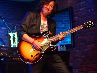 Toshi Yanagi photo
