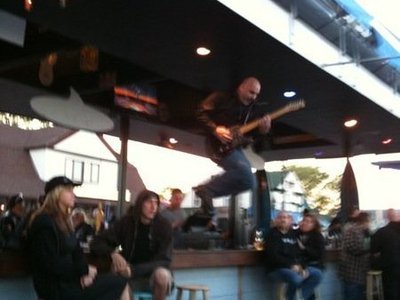 Leaping off the bar at The Landshark in Freeport