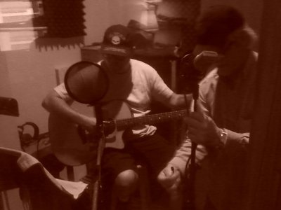 Steve on guitar in the booth about to record acoustic tracks