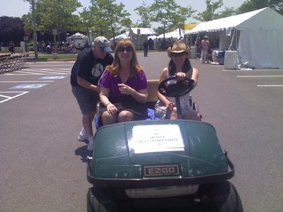Riding the golf cart at Celebrate Fairfax