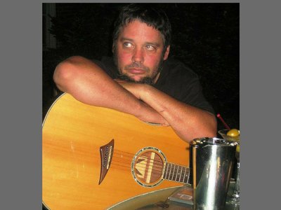 Chris Nickey and his Acoustic Guitar photo