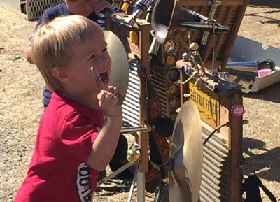 This little guy couldn't get enough cymbal