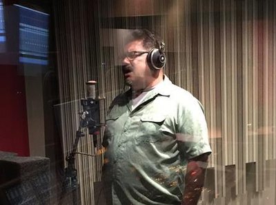 Rey tracking lead vocals at The Art Institute of Houston