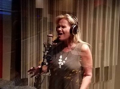 Julie tracking backing vocals at The Art Institute of Houston