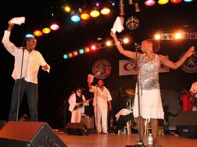 Tom and Trish celebrate on stage July 2010