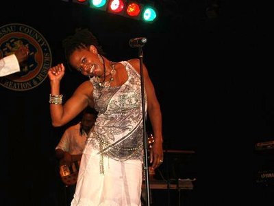 Trish smiles onstage July 2010