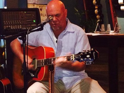 Fred Chandler Performing Solo in Dunedin at a Wine Bar