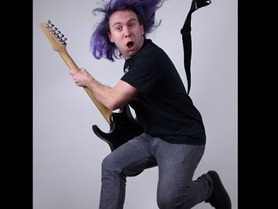 Look at this dude modeling those long golden.. I mean purple locks