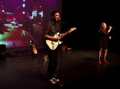Still from Greencard Wedding's indie rock musical