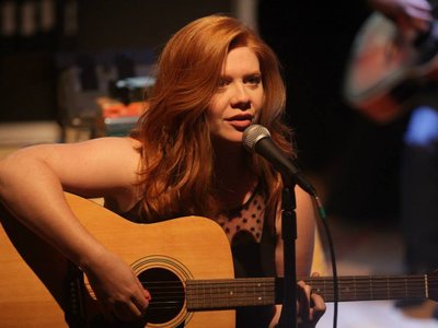 Still from Greencard Wedding's indie rock musical