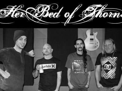 HER BED OF THORNS photo