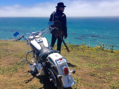 AMPAGE Lead Vocalis Mark Mason finishing new Motorcycle song "Rolling Dogs Of Thunder"
