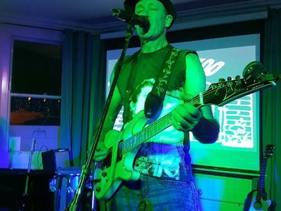 Nigel Harrington on guitar