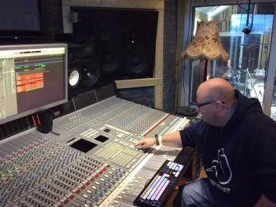 Elton playing being the producer