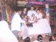 Giving widows rice in Korokunda India