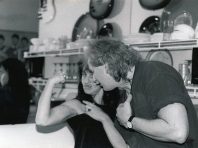 Tracy Bonham flexing her muscle as Red looks on with awe. (The Cellblock, Somerville, MA 1994)