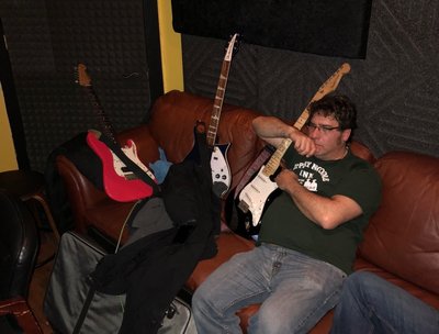 Guitarist Steve Siegel listening to playback of newest single Wasted