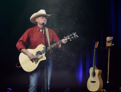Grant performing on television in Boston