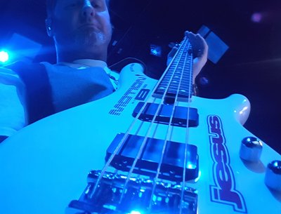 Me with my Yamaha Motion B3 bass. I love it. 3/4 scale for my small hands...   ;-)
