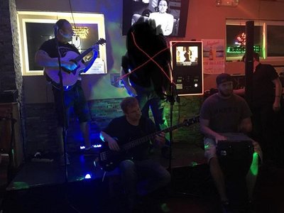Some cheap bar near Williamstown, NJ. Last minute, I sacrificed Breaking Benjamin just to play that.