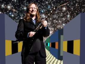 Photo by Alex Maness / Background design by Jay Kilby
