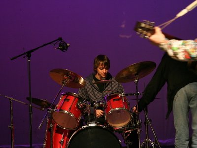 J. Edward Cullen jams on the drum kit during pre-show.