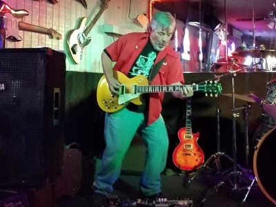 Dave "The Hound" Brown - Guitar, Occasional Vocals