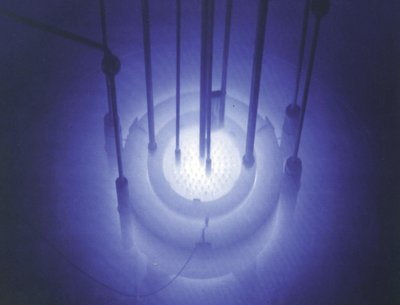 NRC picture of Cerenkov radiation surrounding the underwater core of the Reed Research Reactor, Reed