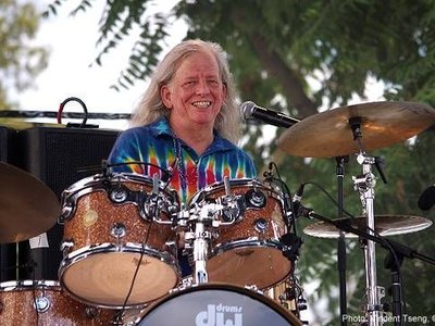 Smiling J.R. plugs DW Drums