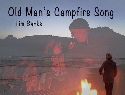 Heat from the embers soak my jeans, warms my skin like the darkness warms my heart.
