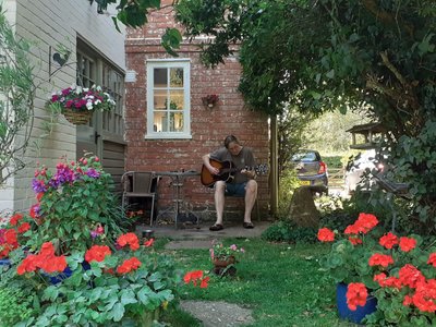 Practising for next weekendâ€™s gigs in my own back yard! Thanks to Megan Weaver for the photo